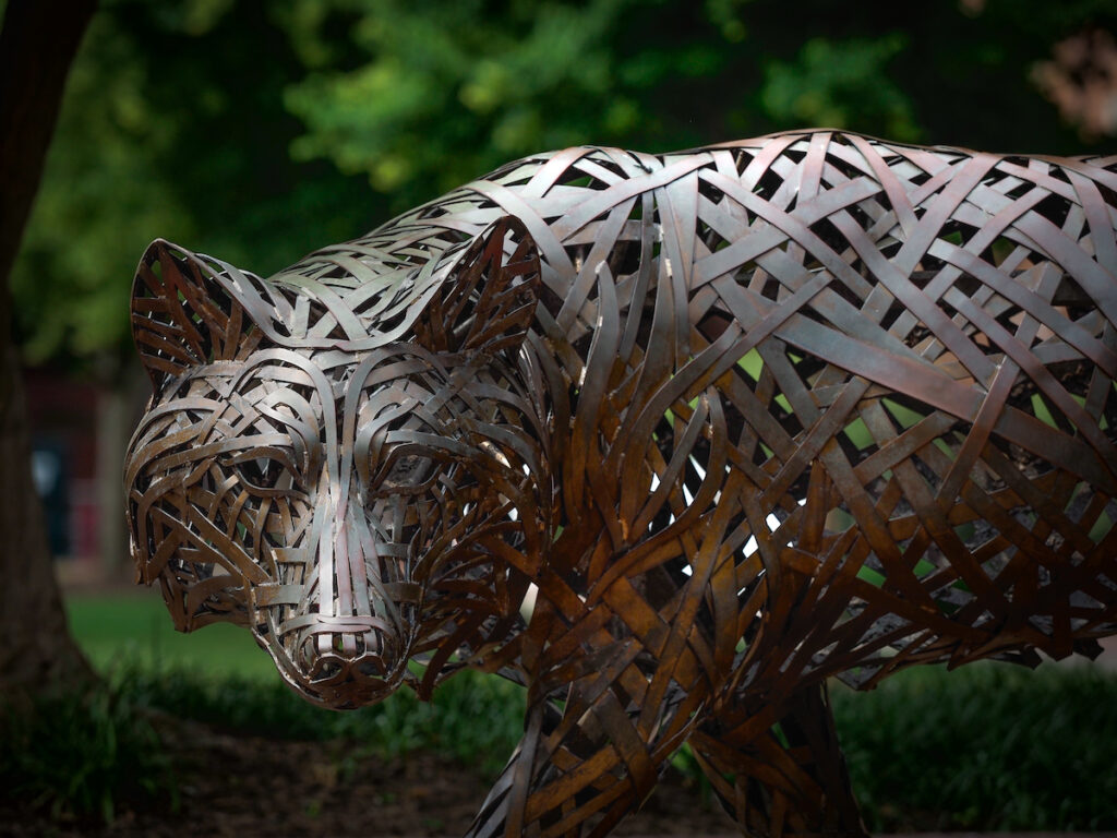 One of the copper wolves at Wolf Plaza on main campus.
