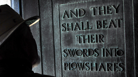 After getting a rare glimpse inside the Belltower, a visitor pauses to read the inscription written upon the Belltower door.