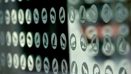 Wolf icons on the Talley Student Union elevator glass wall.